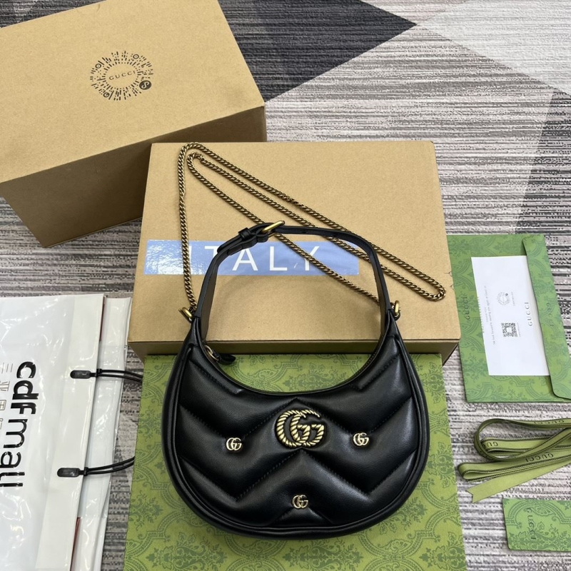 G*u*i top handle bags